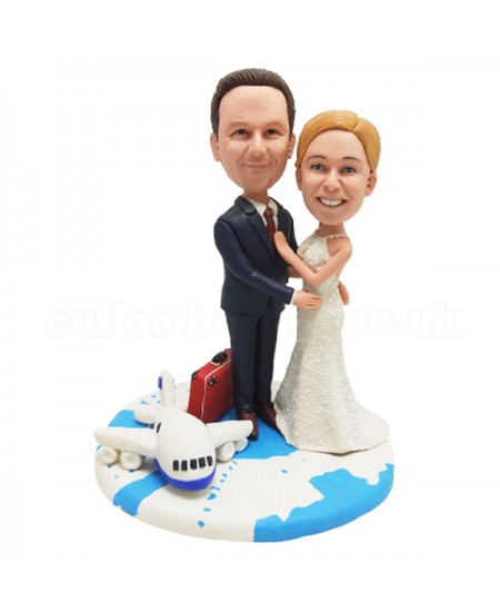 custom bobblehead travel around the world wedding cake topper