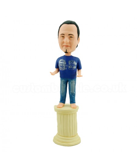 customised casual man standing on a pillar