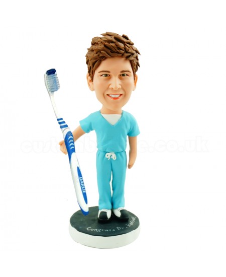 customised dentist bobble head with a big toothbrush
