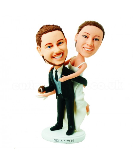 customised wedding cake topper football fan bride jump on groom