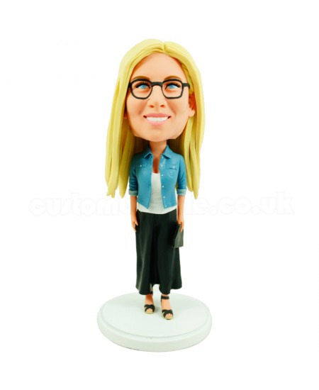 personalised bobblehead in a denim jacket and black skirt