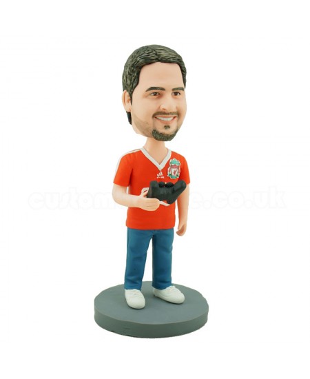 personalised gamer bobblehead carrying a gamepad