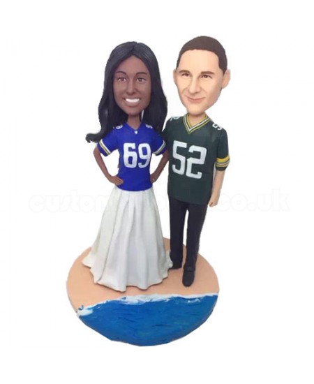 american football fans couple bobbleheads