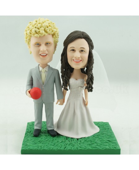 american football fans couple bobbleheads