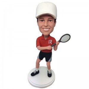 custom male bobblehead waving a tennis bat