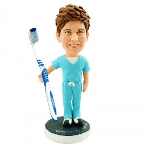customised dentist bobble head with a big toothbrush