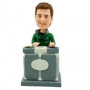 customised dj bobblehead swings the record