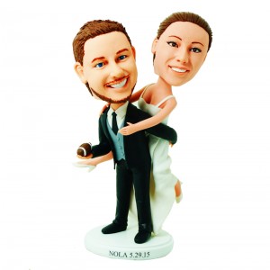 customised wedding cake topper football fan bride jump on groom