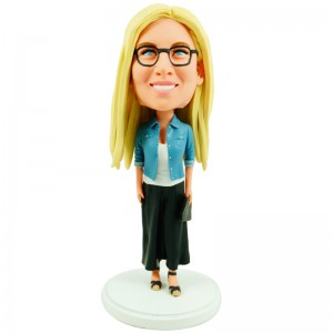 personalised bobblehead in a denim jacket and black skirt