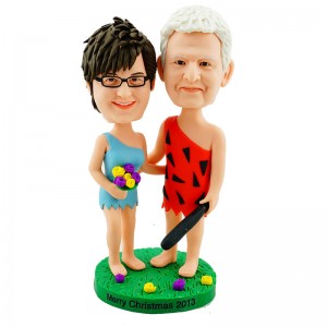 personalised couple bobblehead in fancy dress with a wooden stick