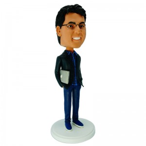 personalised smart man bobblehead carrying a mac laptop