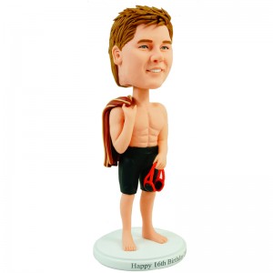 personalised strong swimmer bobblehead with school uniform on the back