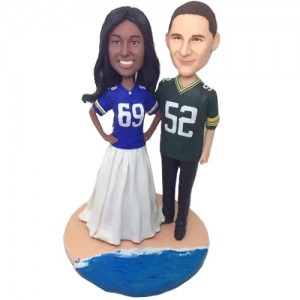 american football fans couple bobbleheads