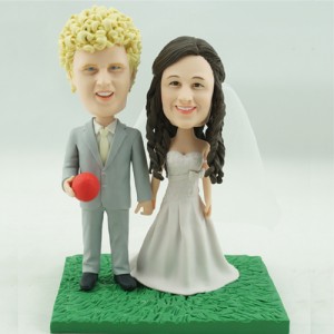 american football fans couple bobbleheads