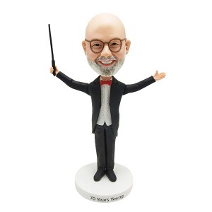 Wearing a fashionable formal dress and swinging the baton custom bobblehead conductor