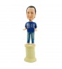 customised casual man standing on a pillar