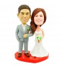 customised wedding cake topper bride holding grooms arm