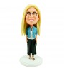 personalised bobblehead in a denim jacket and black skirt