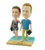 personalised couple bobblehead walking on sandbeach