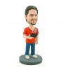 personalised gamer bobblehead carrying a gamepad