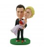 personalised wedding cake topper groom holding up bride